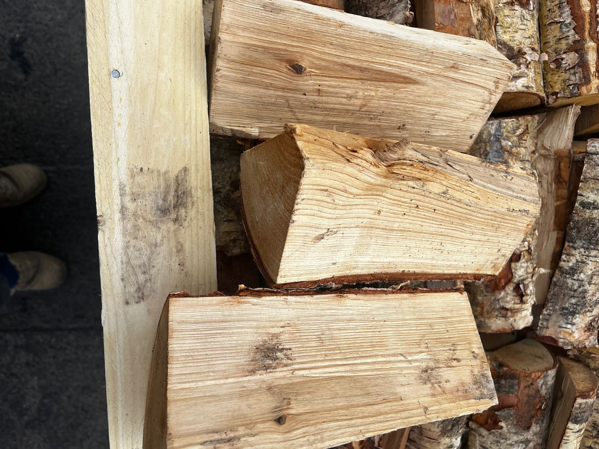 Stack of Birch wooden logs Murphys Direct UK